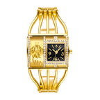 LX1052 Live Edition Women's Golden Feather Diamond Bezel Quartz Watch - 37x27.5mm Asymmetric Gold Case Arched Glass Cage Bangle Band Wristwatch